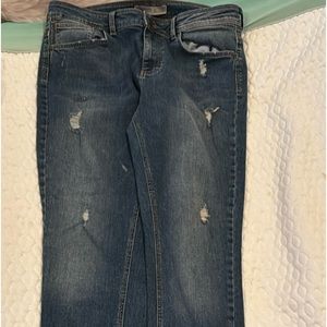 Zara med dark with some distress areas.